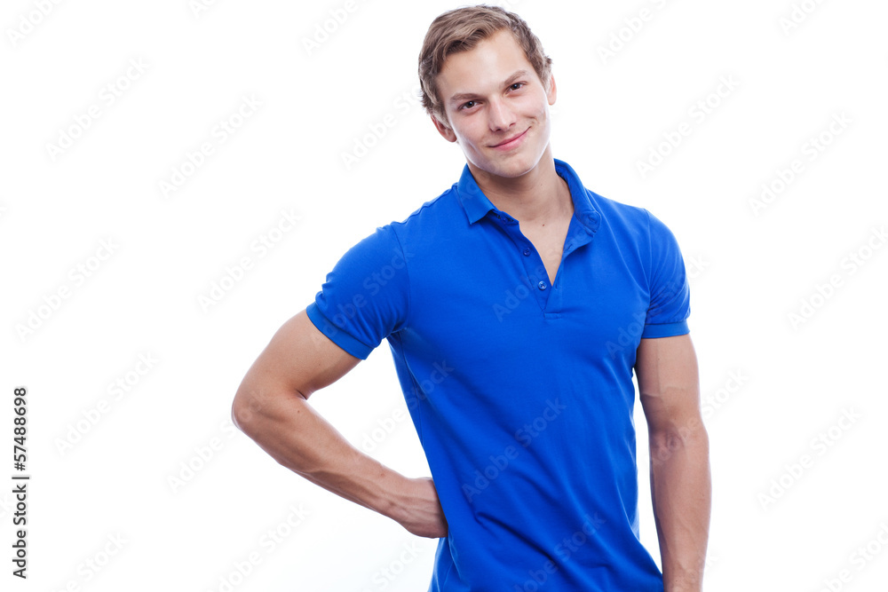 Portrait of a young handsome man wearing blue t-short isolated o Portrait of a young handsome man wearing blue t-short isolated o