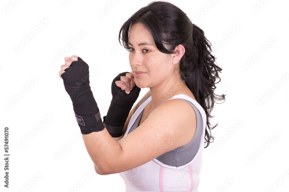 Female mixed martial arts fighter wearing MMA style gloves Stock