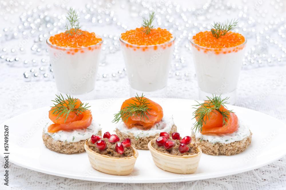 holiday appetizers - canape with salmon, tartlet with liver pate holiday appetizers - canape with salmon, tartlet with liver pate