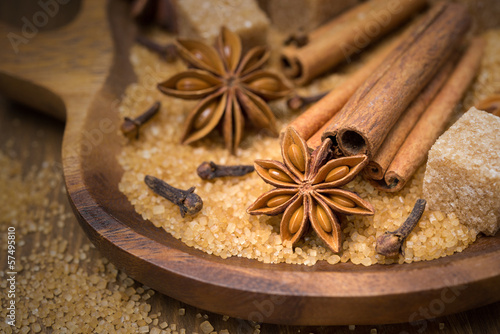spices and brown sugar for baking in a wooden bowl