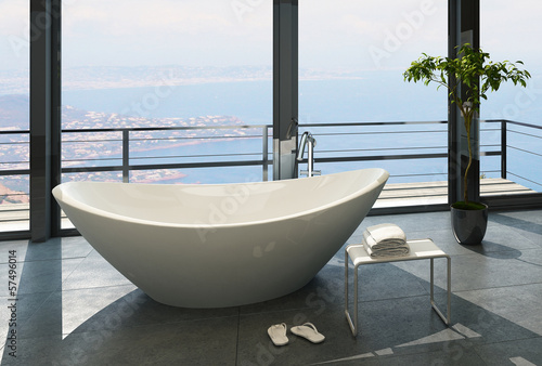 Expensive luxury bathtub against panoramic window with nice view