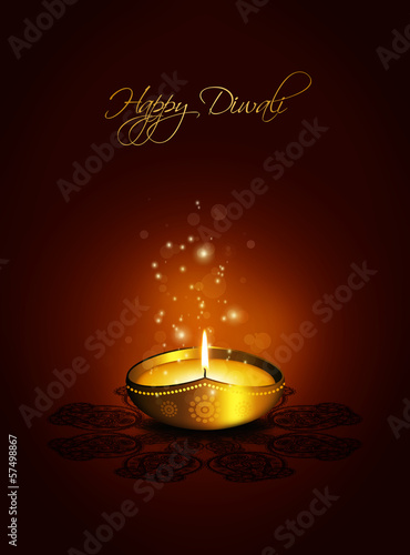 oil lamp with plac for diwali greetings over dark background