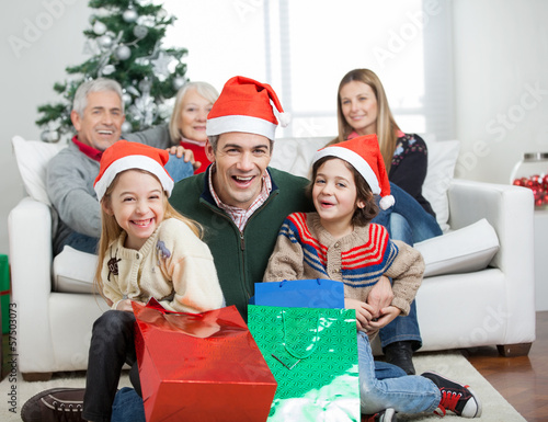 Happy Family With Gifts During Christmas