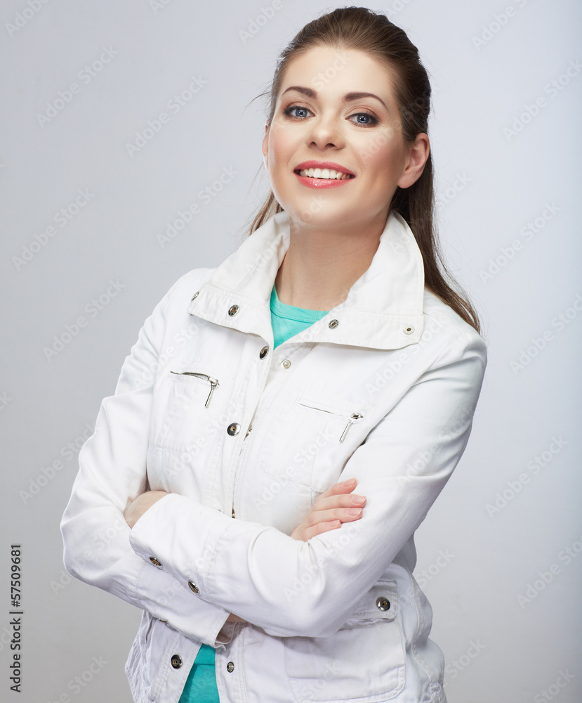 Casual style young woman posing on isolated studio background. Casual style young woman posing on isolated studio background.