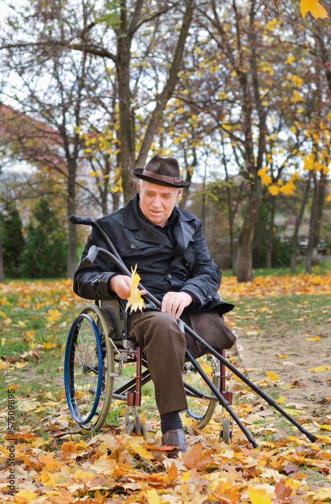 Senior handicapped man in a wheelchair