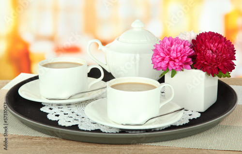 Fototapeta Naklejka Na Ścianę i Meble -  Cups of coffee on tray on table in cafe