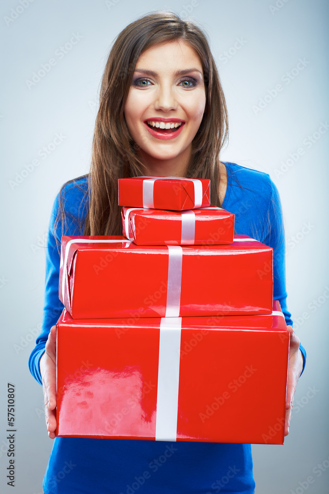 Portrait of young happy smiling woman hold red gift box. Isolat Portrait of young happy smiling woman hold red gift box. Isolat