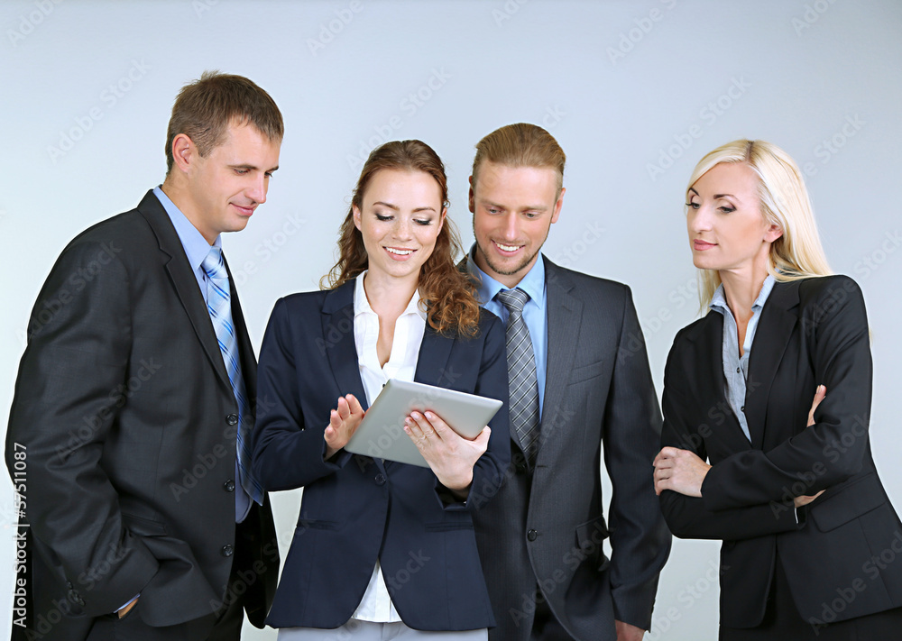 Group of business people on gray background Group of business people on gray background