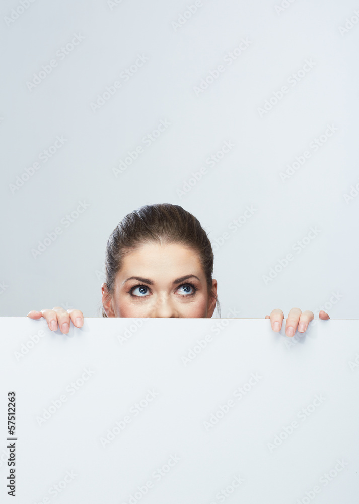 Business woman face looking out white banner. Business woman face looking out white banner.