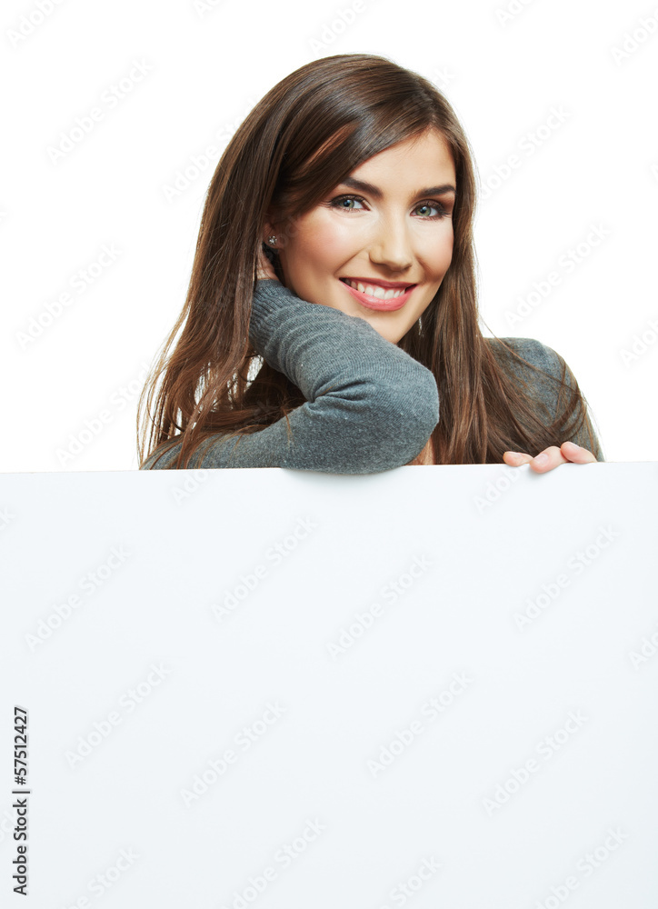 Smiling woman leaning on big blank board . Close up female face Smiling woman leaning on big blank board . Close up female face