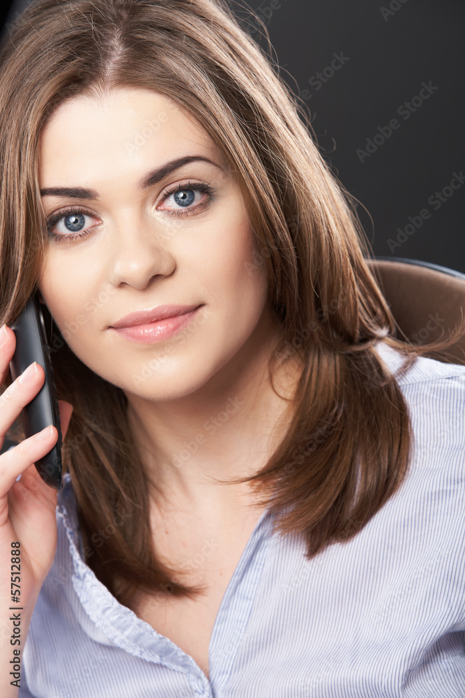 Naklejka premium Beautiful business woman sitting in chair