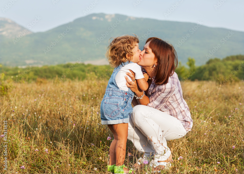 Mother and daughter in the park Mother and daughter in the park