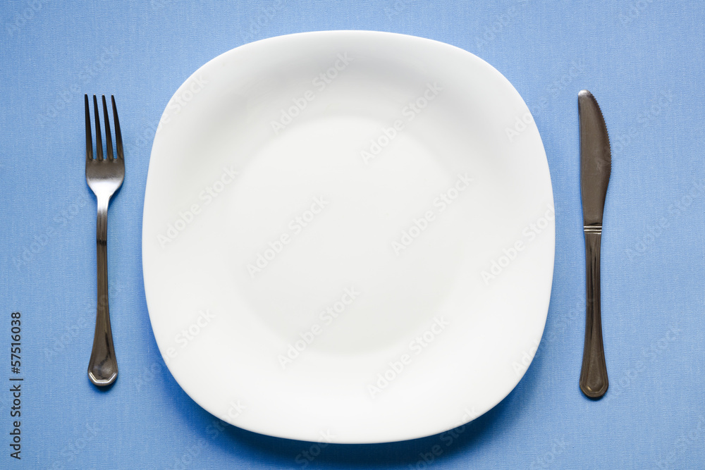 empty plate on blue empty plate on blue