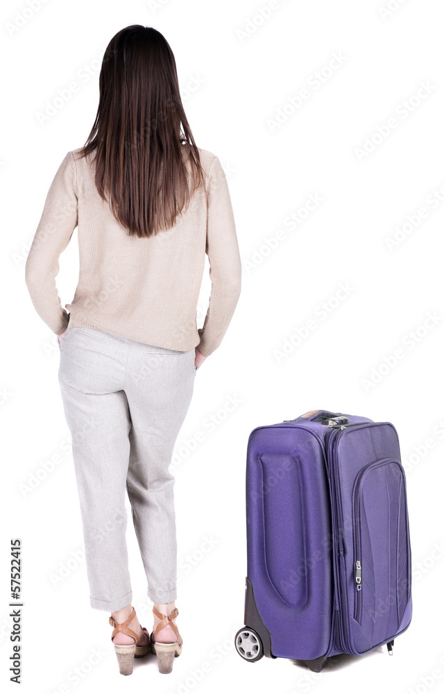 back view of standing young beautiful brunette woman. back view of standing young beautiful brunette woman.