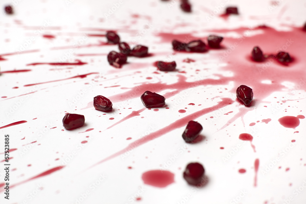 Fototapeta premium Red pomegranate fruit seeds and juice