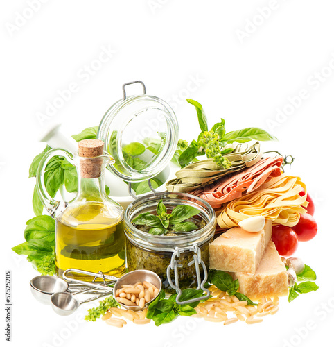 green pesto sauce and ingredients for preparation