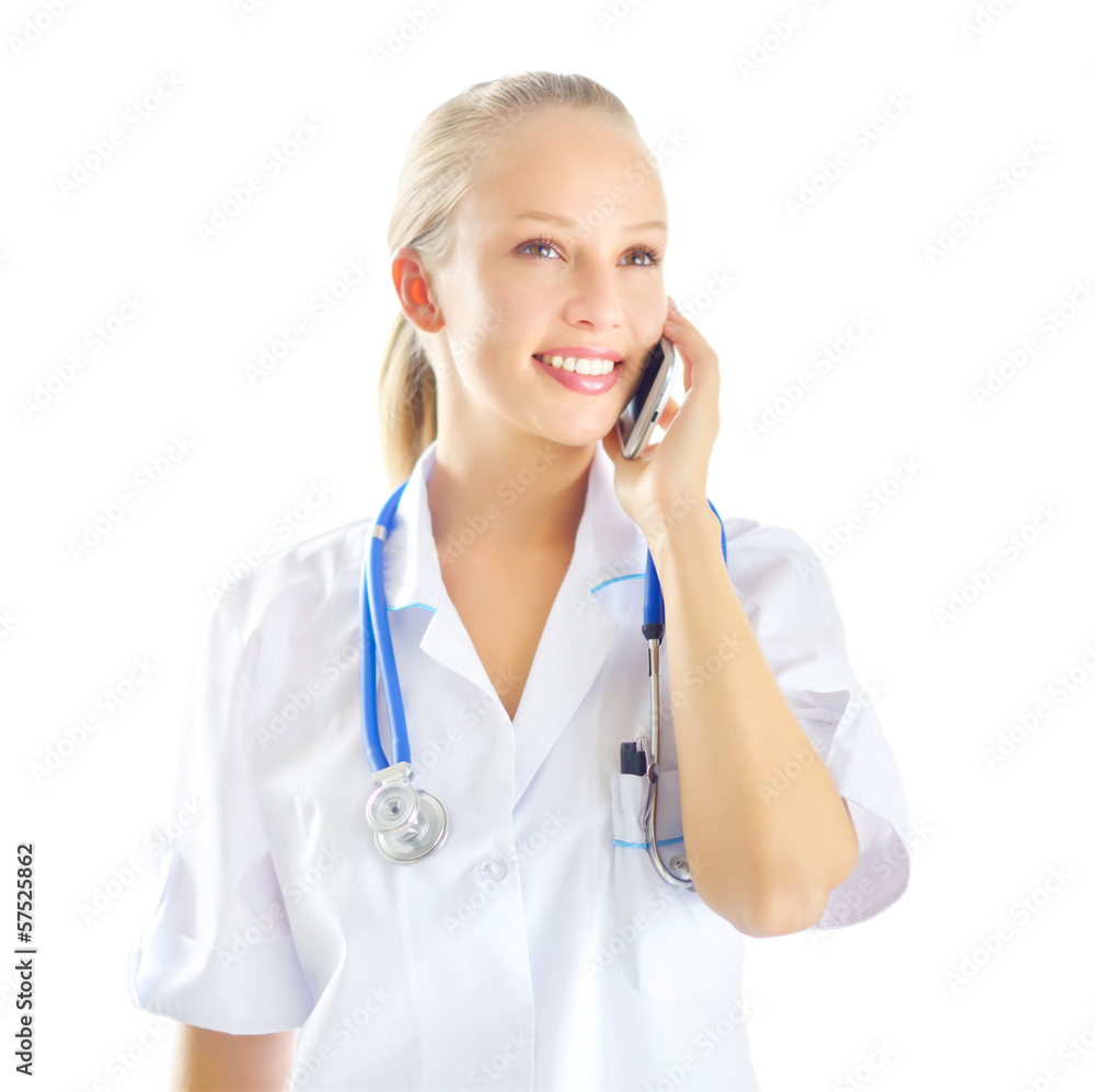 Female doctor talking on the cell phone isolated on white Female doctor talking on the cell phone isolated on white