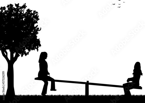 Girls in the park on a seesaw silhouette