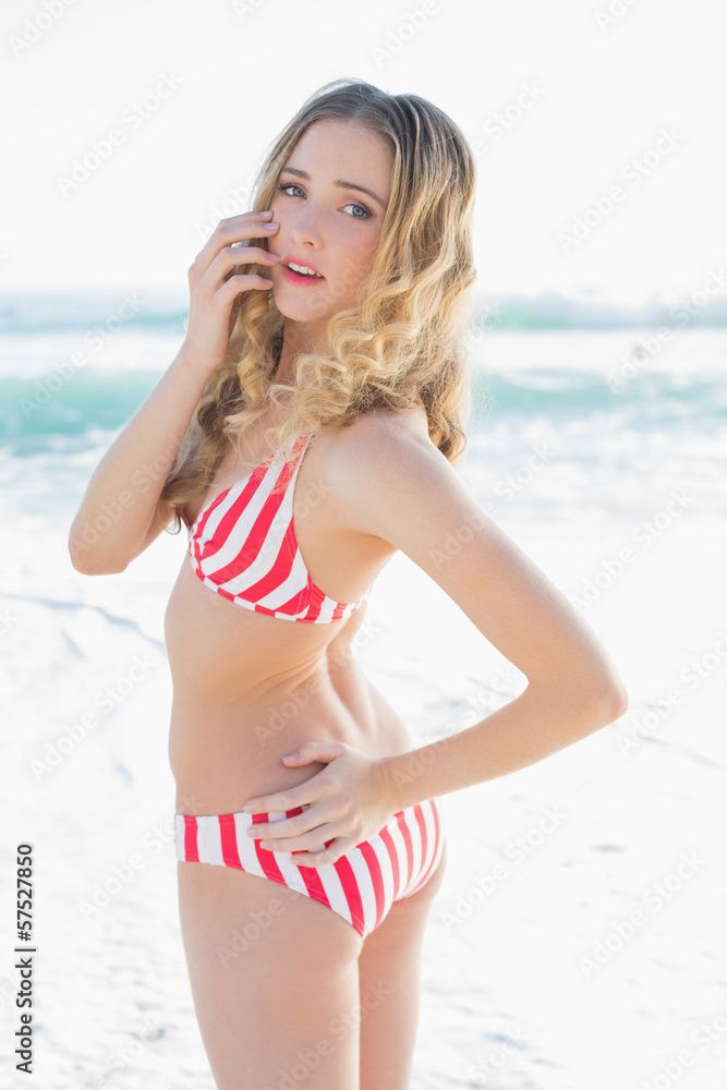 Beautiful young woman wearing a red bikini Beautiful young woman wearing a red bikini