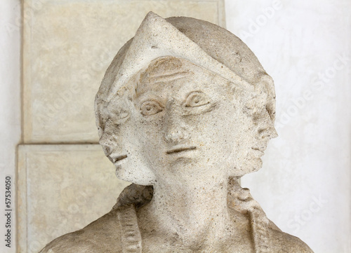 Close-up on a Statue's Three-Faced Head