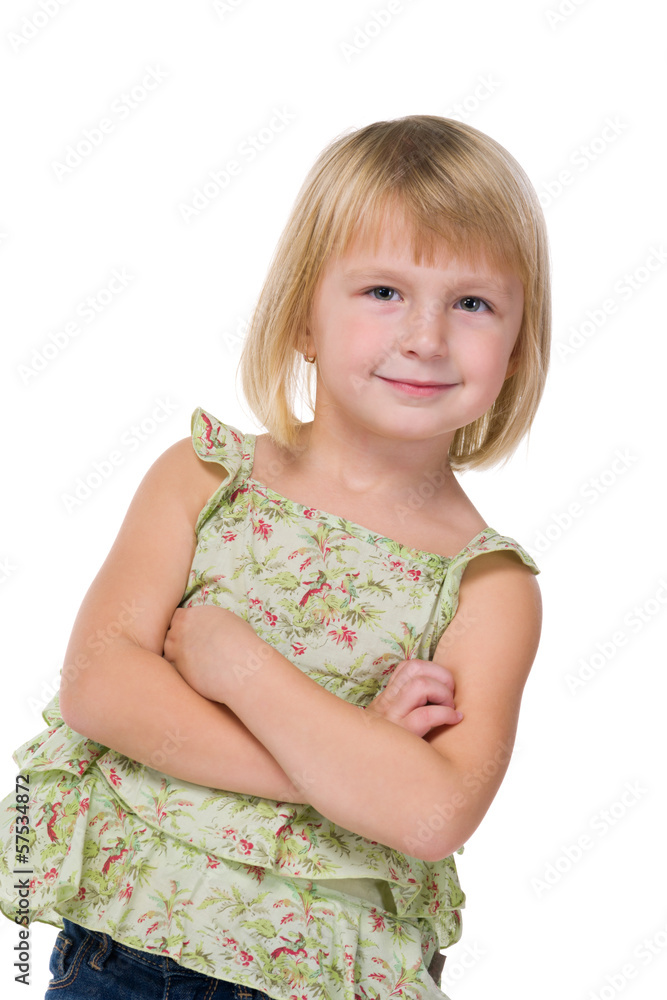 Confident little girl looks forward Confident little girl looks forward