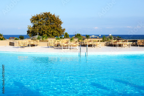 Swimming pool near beach at the luxury hotel, Halkidiki, Greece