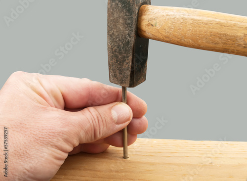Nail and hammer