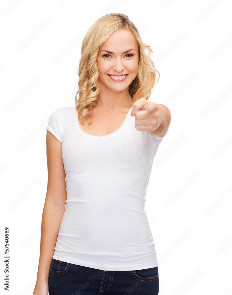 happy woman in blank white t-shirt pointing at you happy woman in blank white t-shirt pointing at you