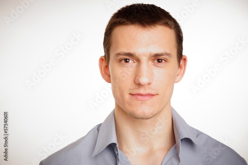 Portrait of young man at shirt. You can write text in left side.