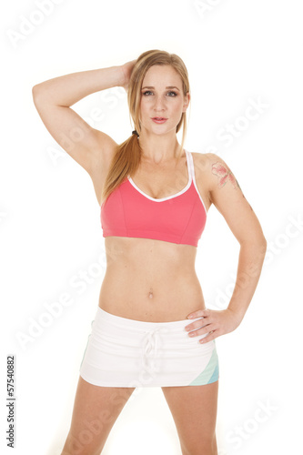 woman pink bra skirt hand head