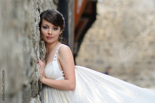 Portrait of a beautiful girl in white. Gentle and elegant style.