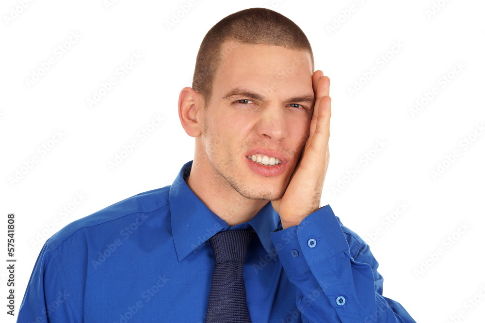 Young man holding your face because suffering from a toothache. Young man holding your face because suffering from a toothache.