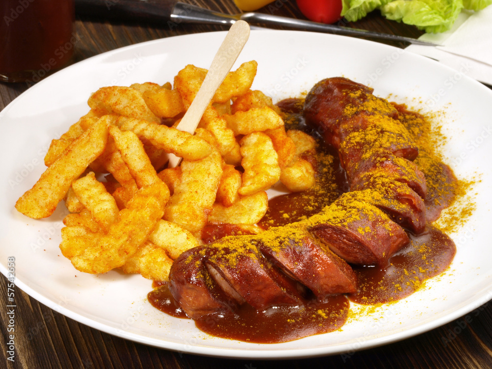 Currywurst mit Pommes Frites Stock-Foto | Adobe Stock