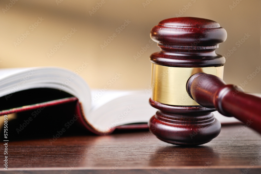 Judges wooden gavel and law book Judges wooden gavel and law book