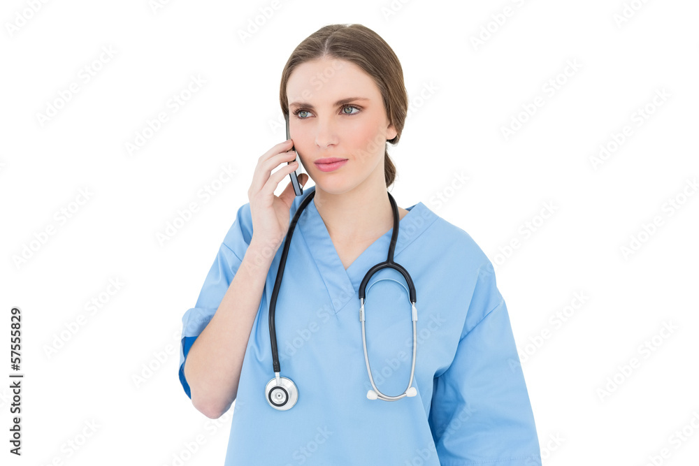 Woman doctor phoning with her smartphone Woman doctor phoning with her smartphone