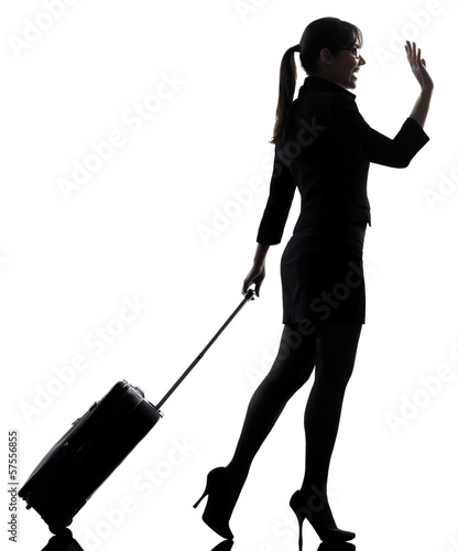 business woman traveling saluting silhouette