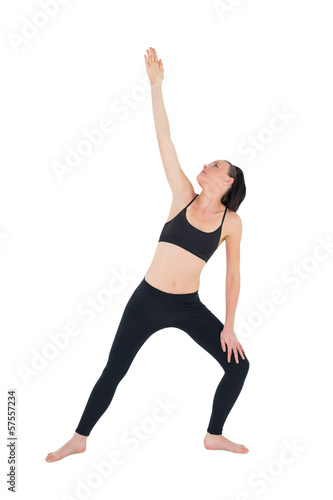 Sporty woman stretching hand over white background