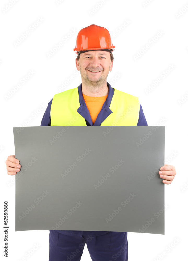 Worker in hard hat with paper. Worker in hard hat with paper.