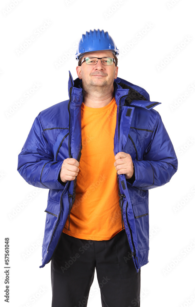 Man in winter workwear and hard hat. Portrait. Man in winter workwear and hard hat. Portrait.