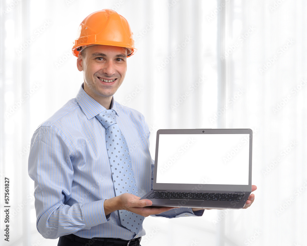 Young engineer with a laptop Young engineer with a laptop