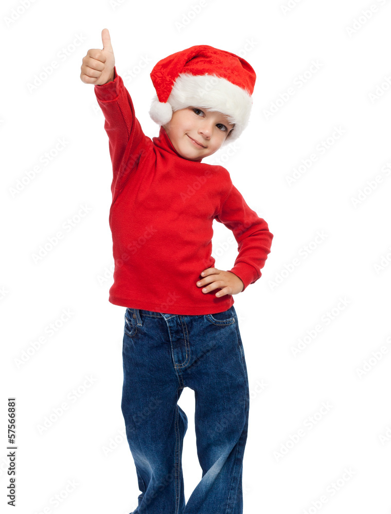 Boy in Santa hat with thumbs up sign Boy in Santa hat with thumbs up sign