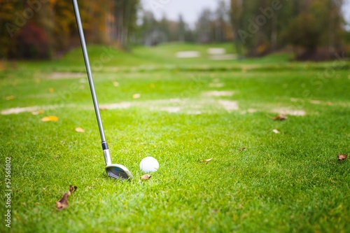 Golf ball before hitting with club from tee