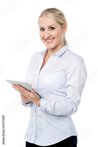 Attractive corporate lady with touch pad