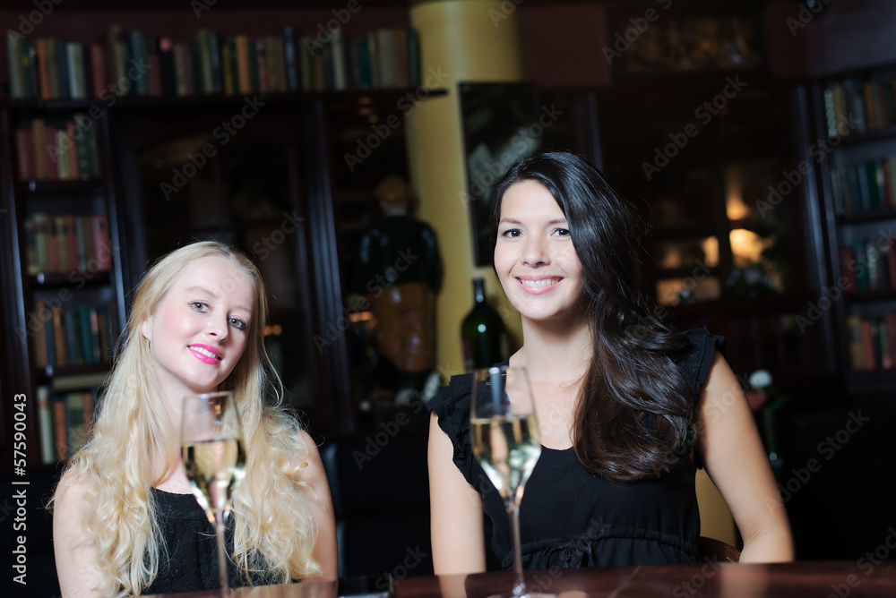 Two women drinking at an upmarket hotel