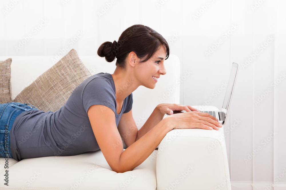 Woman With Laptop On Sofa Woman With Laptop On Sofa