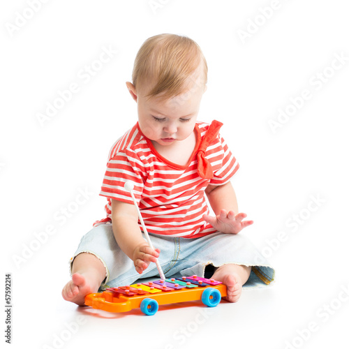 child girl playing musical ...