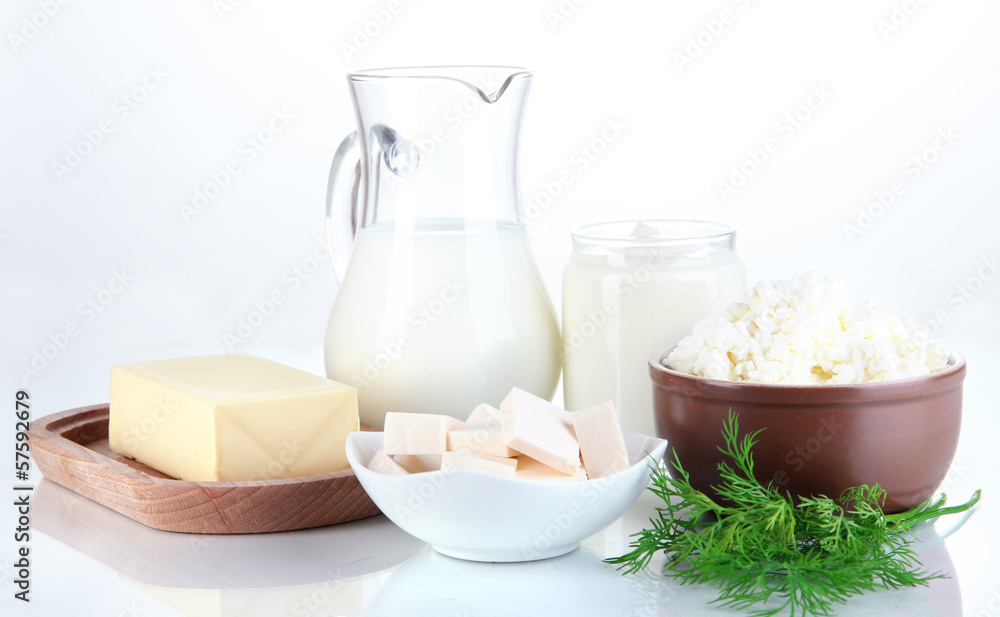 Fresh dairy products with greens isolated on white Fresh dairy products with greens isolated on white