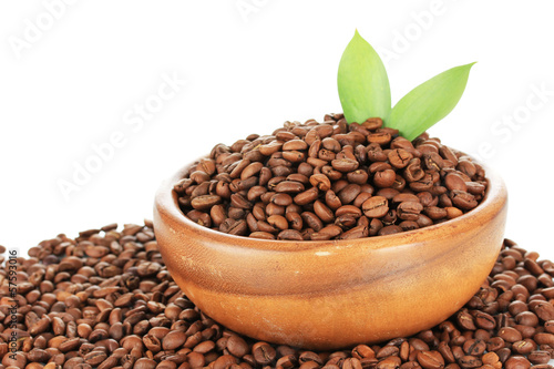 Coffee beans in bowl on white background