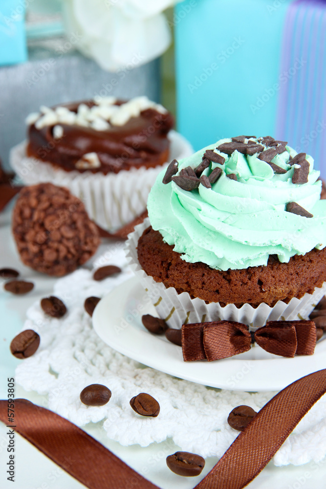 Tasty cupcake with gifts close up Tasty cupcake with gifts close up