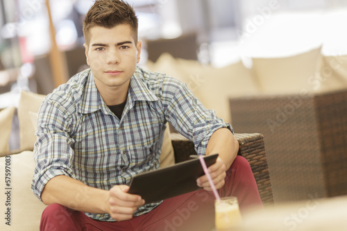 Young man with tablet